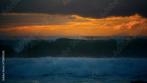 Powerful storm wave rolling stunning cloudy seascape. Huge ocean surf crashing