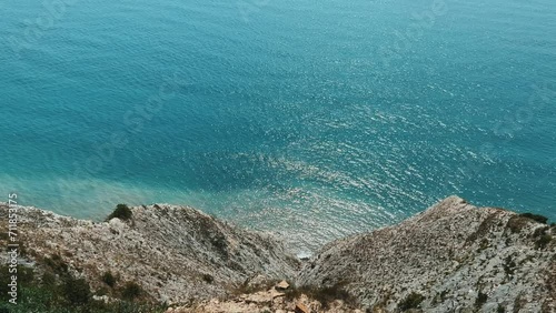 Panoramic view of the sea surface from the coast. Black Sea, Anapa, Krasnodar Territory, Russia. Sunset view of Bald Mountain near the village of Supseh. The beach has 800 steps. 4K Video photo