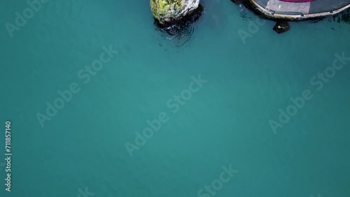 Siwash Rock, top down view, flying over the landmark next to the Stanley Park seawall  photo