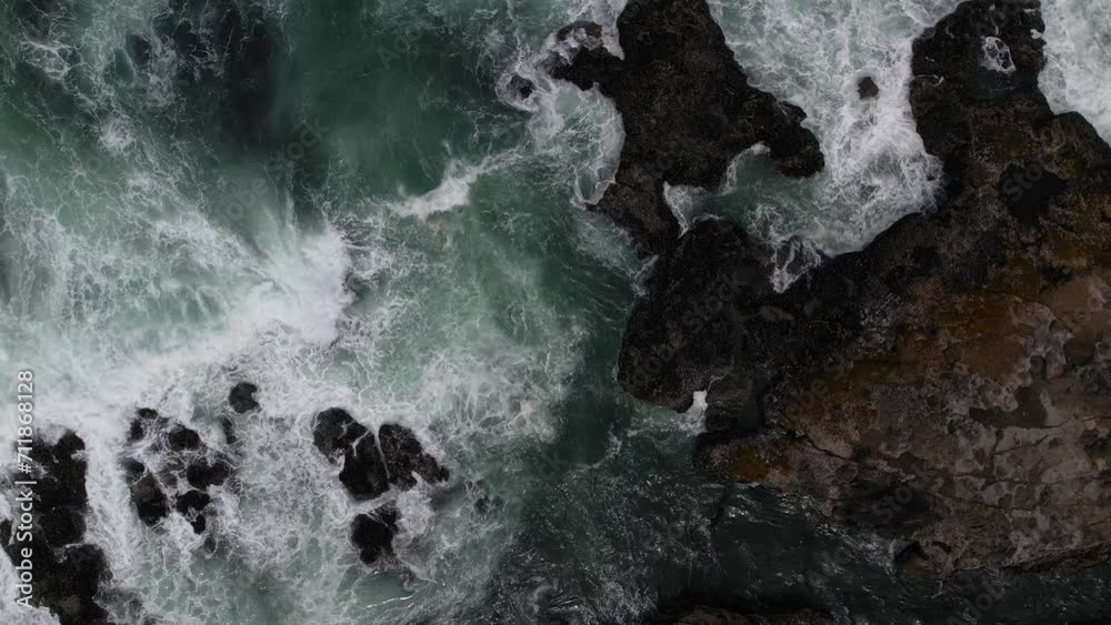 Ocean surf from above on a rocky section of the Oregon coast. Ocean surf from above on a rocky section of the Oregon coast.