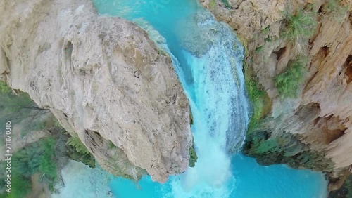 Water falls from Havasu Creek at autumn day in Grand Canyon