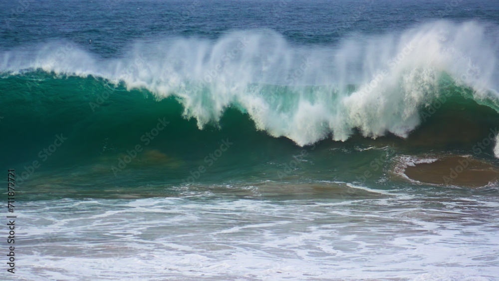 Huge ocean surf barrelling in super slow motion. Powerful wave rolling breaking Huge ocean surf barrelling in super slow motion. Powerful wave rolling breaking