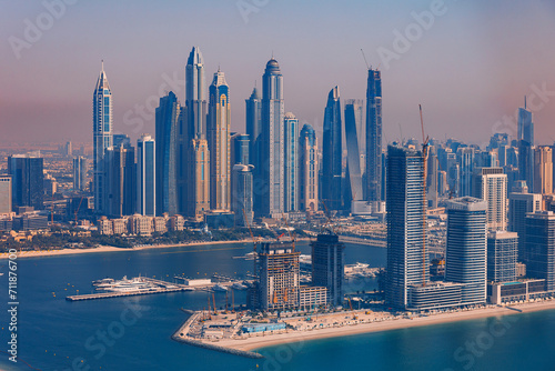 Aerial top view futuristic skyscraper of Dubai, panorama Marina JBR sand beaches, sunset. Downtown of UAE, concept tourism © Parilov
