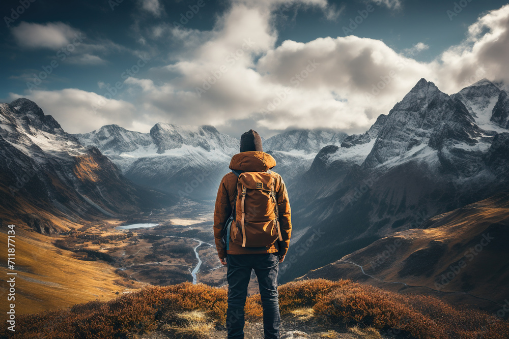 A man with a backpack behind his back looks at the mountains. Travel alone concept. Generated by artificial intelligence