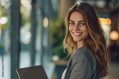 Woman Smiling With Laptop Computer