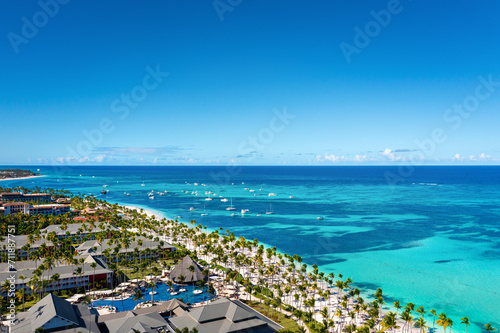 Tropical beach with resorts, palm trees and caribbean sea. Dominican Republic. Aerial view © photopixel