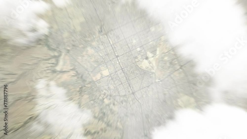Earth zoom in from space to Riyadh, Saudi Arabia. Followed by zoom out through clouds and atmosphere into space. Satellite view. Travel intro. Images from NASA