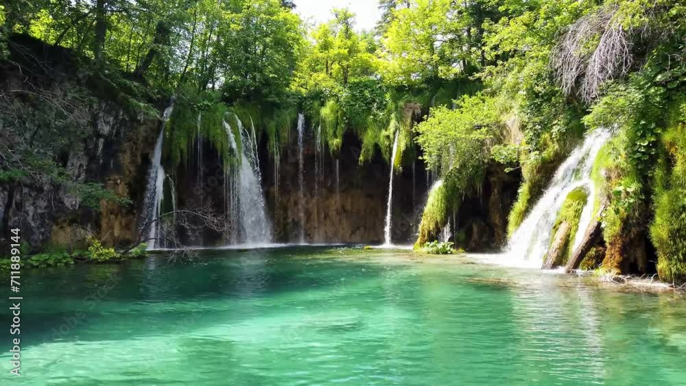 Majestic view on waterfall with turquoise water in the Plitvice Lakes National Park, Croatia. Europe. One of the oldest and largest national parks in Croatia. UNESCO World Heritage Majestic view on waterfall with turquoise water in the Plitvice Lakes National Park, Croatia. Europe. One of the oldest and largest national parks in Croatia. UNESCO World Heritage