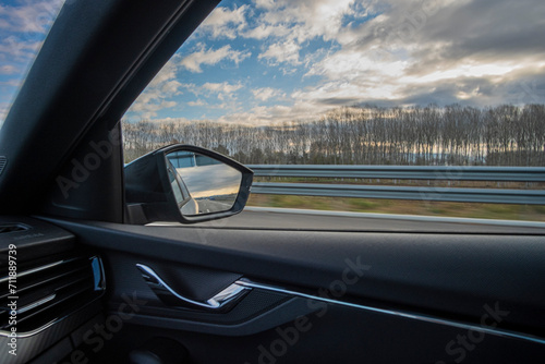 Cuadro en lienzo Right side window view scene of a road car on a highway on a beautiful forest la
