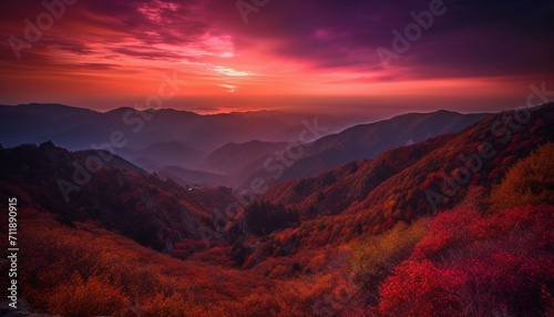 Majestic mountain peak, sunset sky, tranquil meadow, autumn forest generated by AI