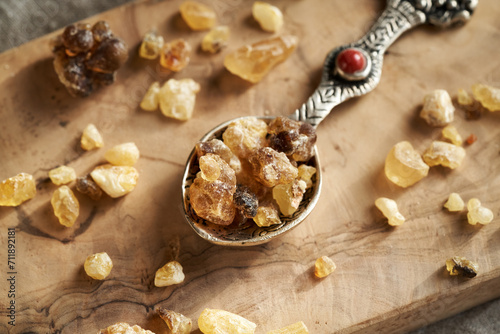 Frankincense resin on an metal spoon