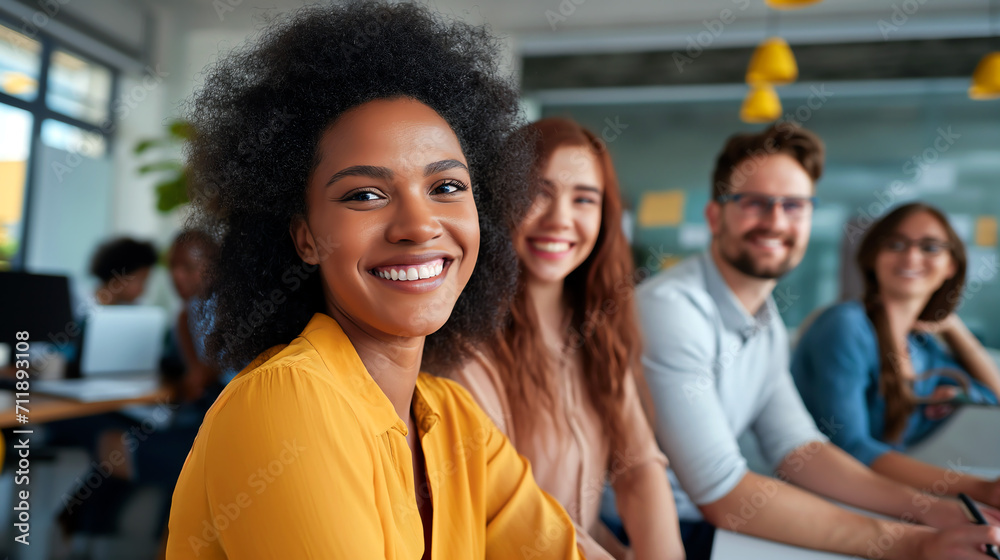 team of diverse colleagues smiling in office