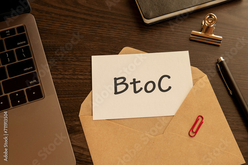 There is word card with the word BtoC. It is an abbreviation for BtoC as eye-catching image. photo