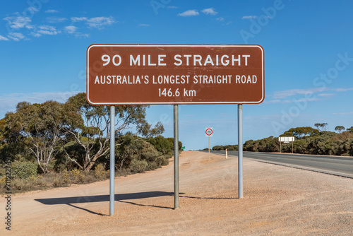 90 Mile Straight sign (Australia's longest straight road) at Caiguna Roadhouse, Nullarbor Plain, South Australia