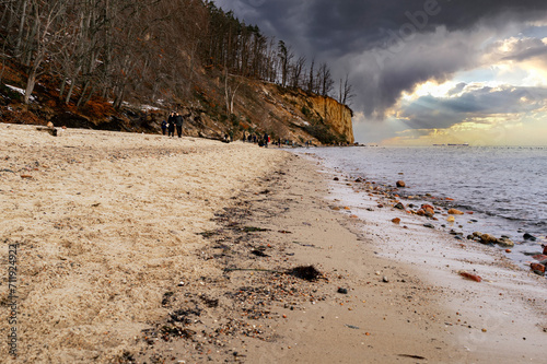 Rocks and sandy beach on the coast of the Baltic Sea in Gdynia photo