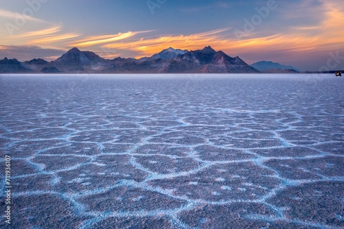 Salt Flats at sunset. Bonneville Salt Flats and mountains. Salt Lake City. Utah. USA photo
