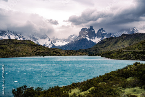 Cuernos del Paine and Lago Peho   under cloudy sky and  hills at front
