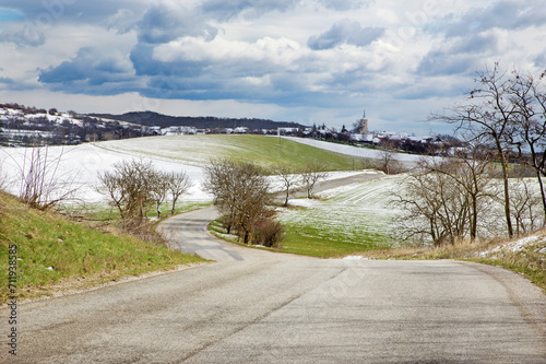 Slovakia - The road in the spring country of Plesivecka Planina plateau.