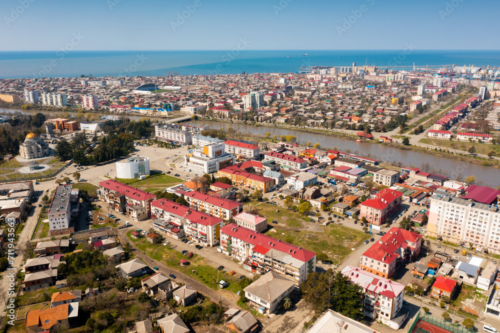 Scenic view from drone of Georgian port city of Poti located at entrance of Rioni river into Black Sea on sunny spring day, Samegrelo-Zemo Svaneti region.