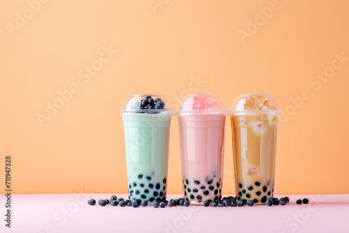 color pop pastel bubble tea drink iced refreshment beverage juice smoothie with tapioca pearls asian sweet shake in plastic cup with straw trendy hipster with light background copy space
