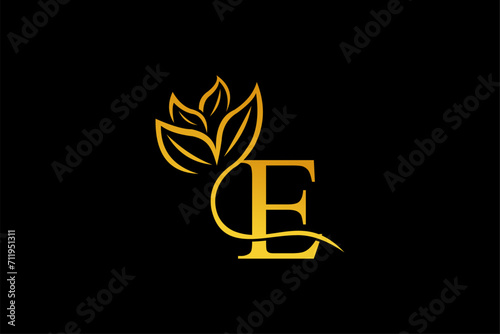 letter E logo design with luxurious gold and elegant floral ornaments. monogram E. icon E flourish. logo for business, company, boutique, salon, beauty, restaurant, brand, etc
