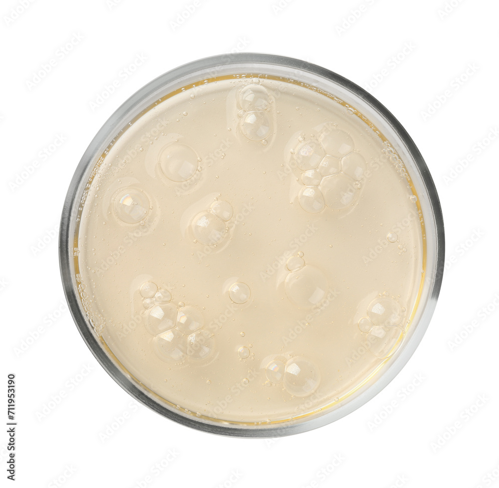 Petri dish with color liquid sample on white background, top view Petri dish with color liquid sample on white background, top view