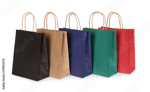 Many paper shopping bags on light background