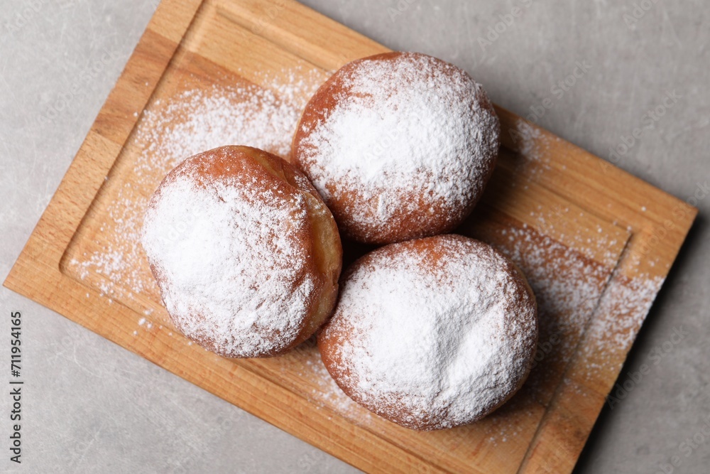 Delicious sweet buns on gray table, top view Delicious sweet buns on gray table, top view