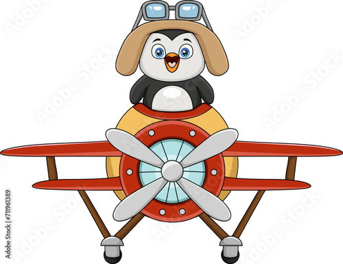 Cute penguin cartoon operating a plane © artnovielysa