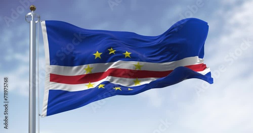 National flag of Cape Verde waving in the wind on a clear day photo