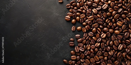 Freshly roasted brown coffee beans on wooden table aromatic espresso aroma natural caffeine beverage dark textured background morning breakfast concept vintage style photography with copy space