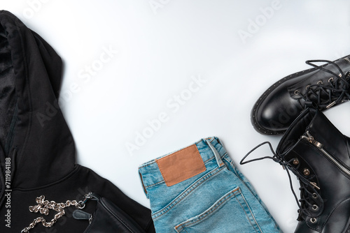 Female casual fashion clothes and accessory set on white background. Copy space