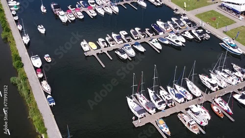 Docked yachts and sailboats in local pier, aerial drone view photo