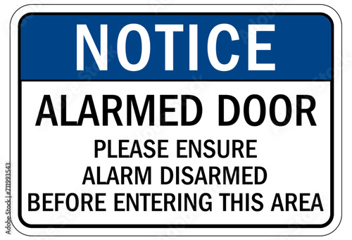 Security alarm sign alarmed door please ensure alarm disarmed before entering this area photo