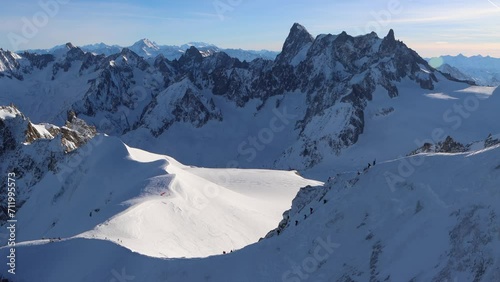 This is the Aiguile Du midi best ever place. When I feel sad I came here with my mind, my heart and starts all. To be a snowboard, skiing man or alpinist, here i'am. White colors. photo