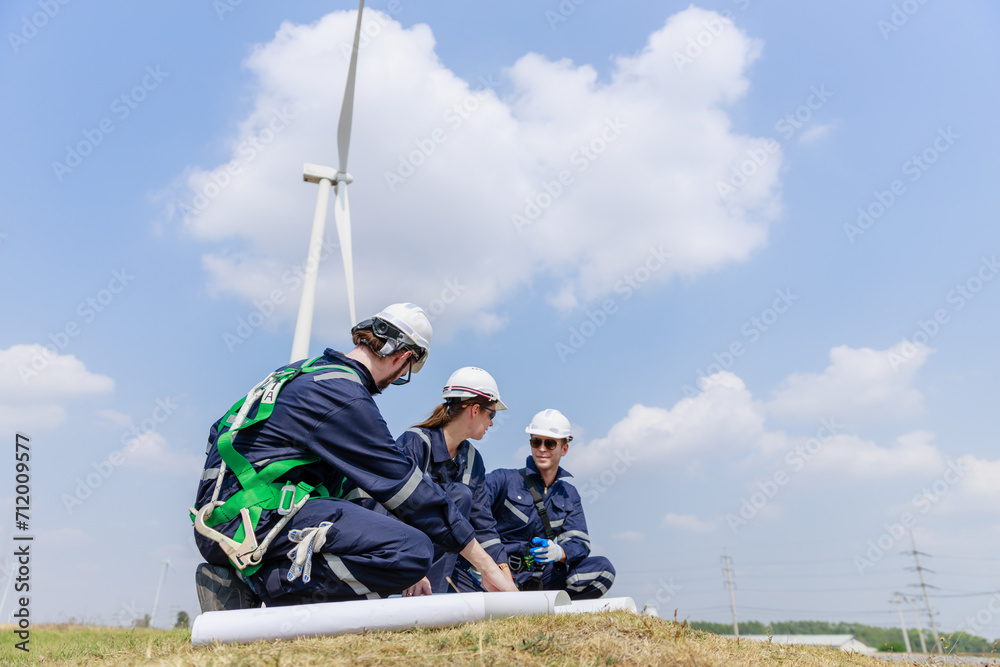 Team engineer wind turbine worker safety uniform survey discuss operational planning windmill field clean energy. Alternative technology protect environment reduce global warming problems. Team engineer wind turbine worker safety uniform survey discuss operational planning windmill field clean energy. Alternative technology protect environment reduce global warming problems.