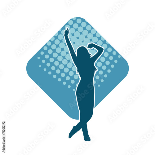 Silhouette of a female dancer in action pose. Silhouette of a woman dancing happily.