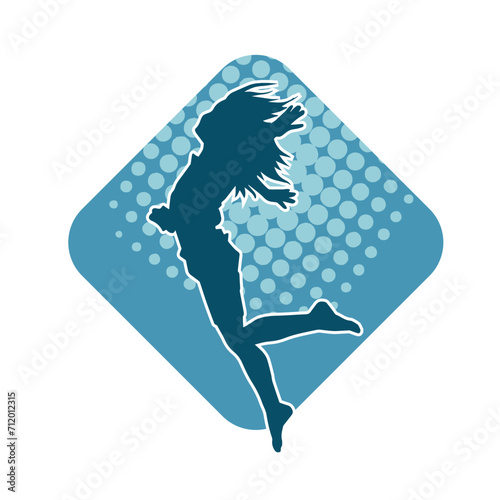 Silhouette of a female dancer in action pose. Silhouette of a woman dancing happily.