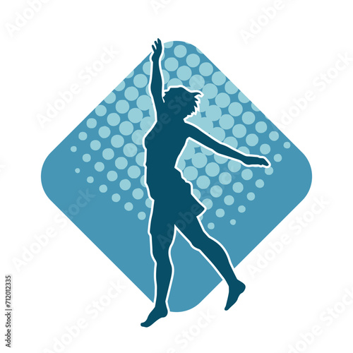 Silhouette of a female dancer in action pose. Silhouette of a woman dancing happily.