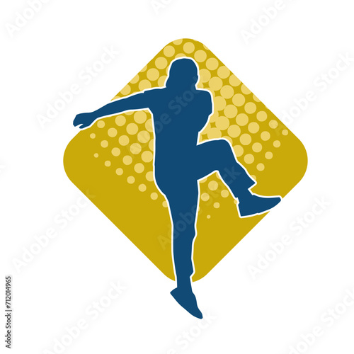 Silhouette of a man in dancing pose. Silhouette of a male dancer in performing pose.
