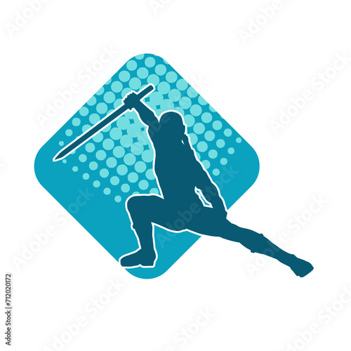 Silhouette of a male warrior in action pose with sword weapon. Silhouette of a man fighter carrying sword weapon.