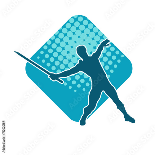 Silhouette of a male warrior in action pose with sword weapon. Silhouette of a man fighter carrying sword weapon.