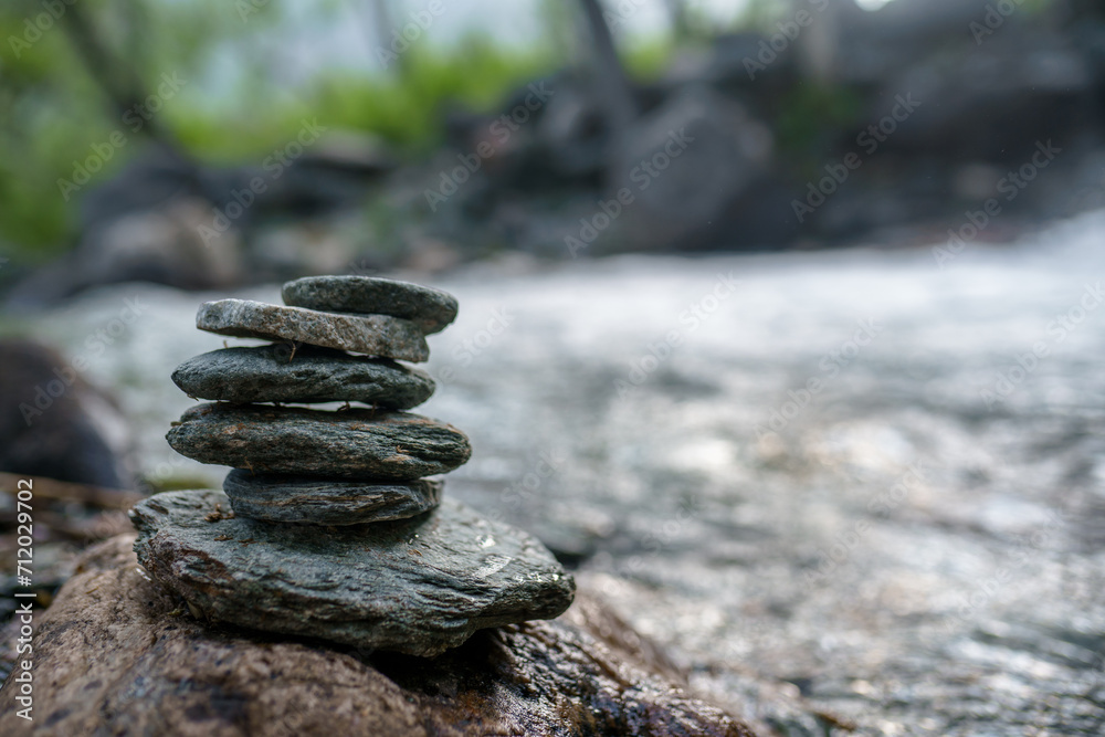 zen stones on the beach ofcreek
