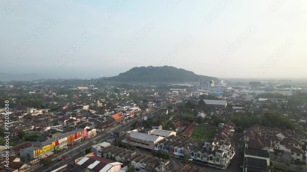 drone view of the dewy hills in the middle of the city