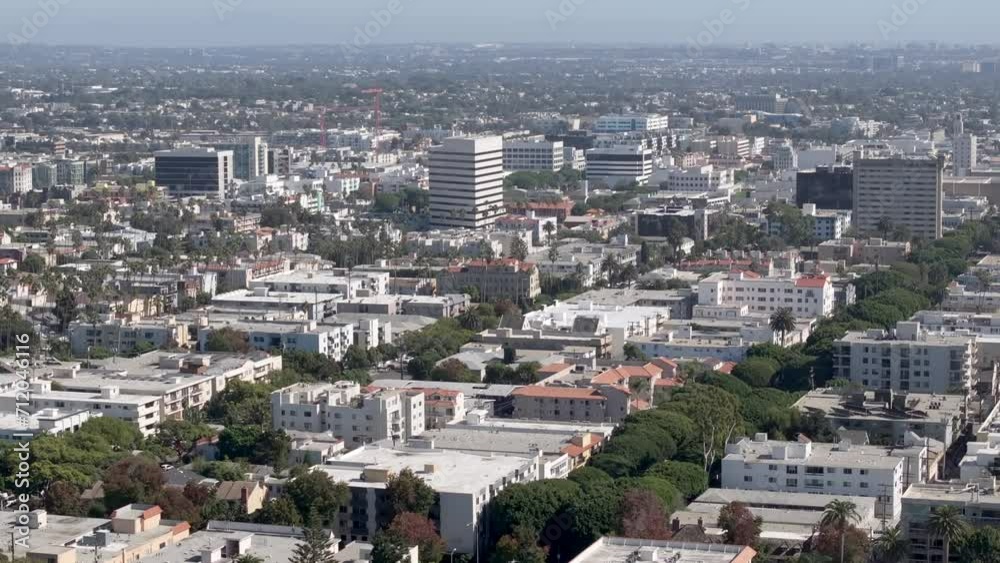 Aerial Rising Shot View Of Santa Monica Cityscape With Variety of Large And Small Buildings Aerial Rising Shot View Of Santa Monica Cityscape With Variety of Large And Small Buildings