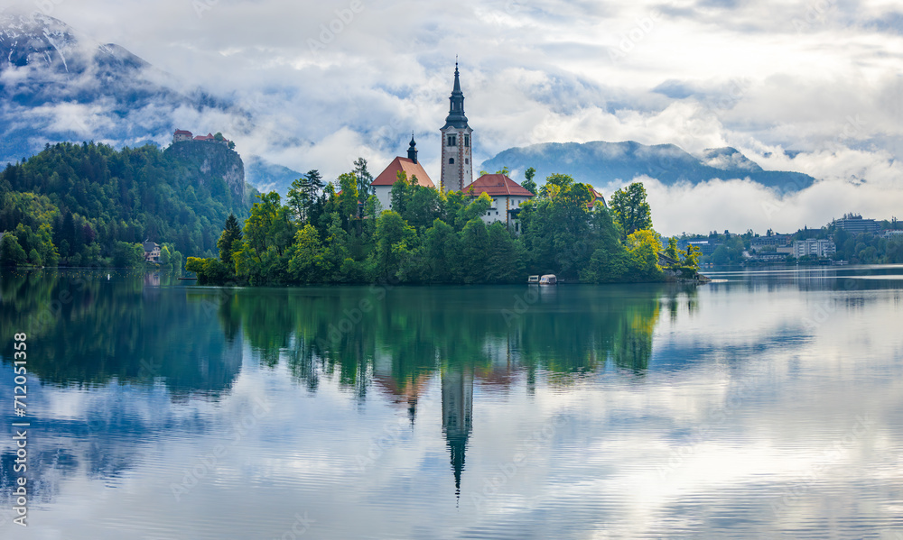 Lake Bled Slovenia with the small island in the middle of the lake and the old church.
Lake Bled Slovenia with the small island in the middle of the lake and the old church.