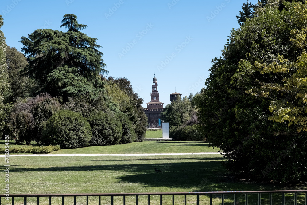 View of Castello Sforzesco (Sforza's Castle), a medieval fortification from the 15th century, from Parco Sempione (Simplon Park) a large city park in the historic center of Milan, region of Lombardy