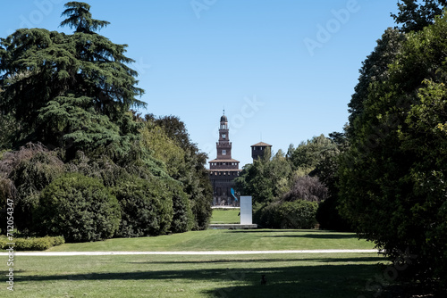 View of Castello Sforzesco (Sforza's Castle), a medieval fortification from the 15th century, from Parco Sempione (Simplon Park) a large city park in the historic center of Milan, region of Lombardy