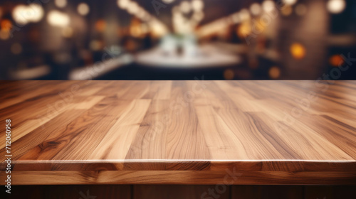 High-quality wooden table top with a warm, inviting blurred bar and bokeh light background.