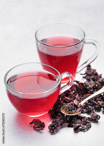 Hibiscus tea in glass mug.